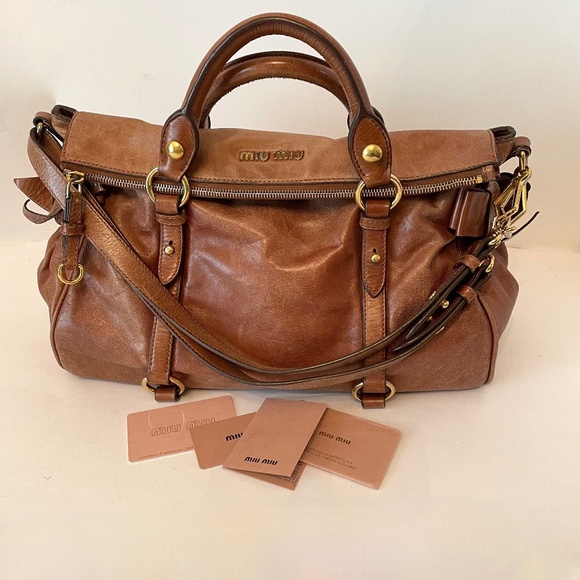 Miu Miu Handbags - Miu Miu Cognac Brown Leather Duffel Shoulder Bag with Gold Hardware